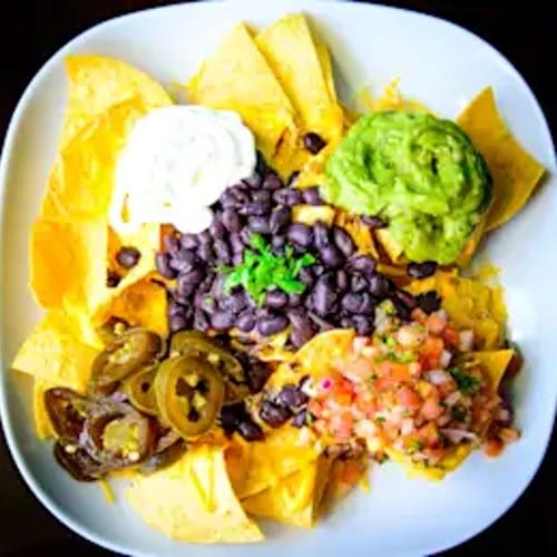 Beef Tongue Nachos Rancheros.